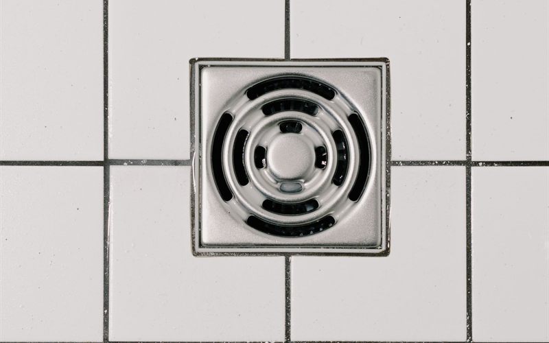 Commercial restroom floor drain cleaned during a Sacramento service call